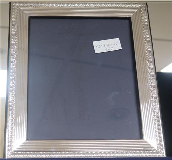 A modern silver mounted photograph frame with reeded border, London, 1992, 32cm.
